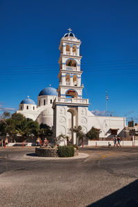 Low angle view of church against clear blue sky