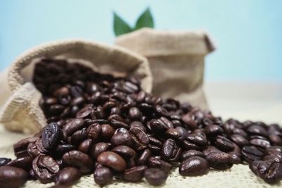 Close-up of coffee beans on table