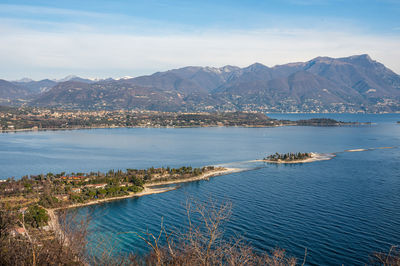 Aerial view of the lake garda with the rabbit island and the garda island from manerba