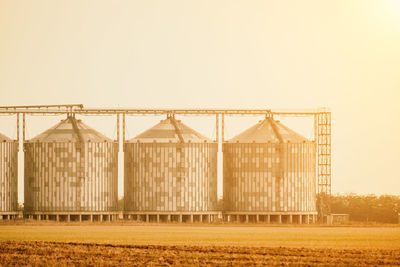 Scenic view of field against clear sky