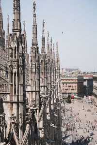 Panoramic view of buildings in city against sky