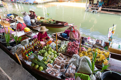 Group of people at market stall