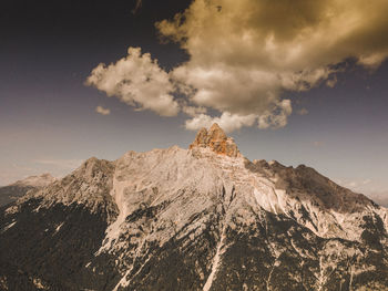 Panoramic view of snowcapped mountains against sky