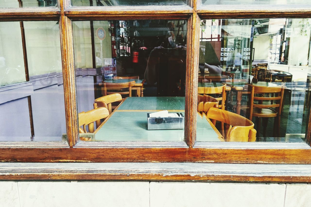 REAR VIEW OF PEOPLE STANDING IN RESTAURANT