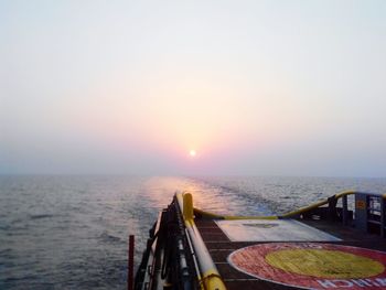 Scenic view of sea at sunset