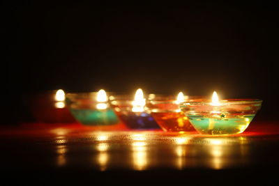 Close-up of illuminated lights at night