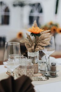 Close-up of wet glass vase on table