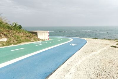 Bicycle lane against sea