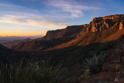 Scenic view of rocky mountains against sky during sunset in big bend national park - texas