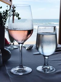 Close-up of wine in glass on table