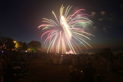 Firework display at night