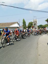 People on road in city