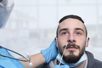 Portrait of young man with stethoscope