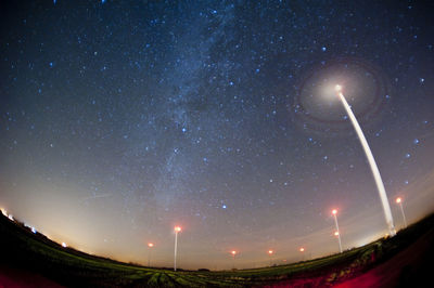 Low angle view of star field against sky at night