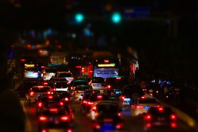 Cars on street at night