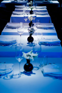 Close-up of blue glass on table