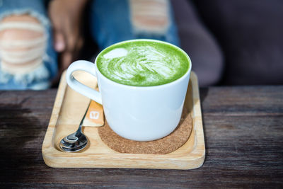 Close-up of coffee served on table