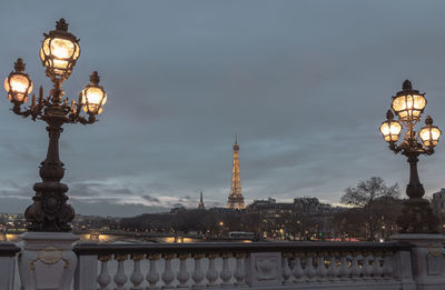 Low angle view of illuminated buildings against sky