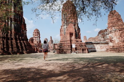 Rear view of woman at historic temple