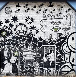 Close-up of text on white wall