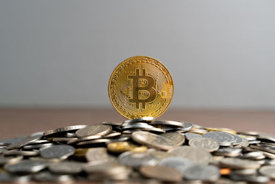 Close-up of coins on black background