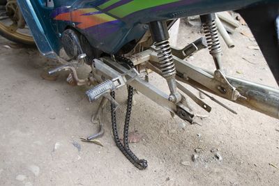 High angle view of an abandoned bicycle on field