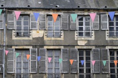 Flags in front of building facade, nevers, burgundy, france