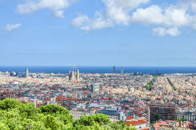 View of spain's barcelona from the hill of three crosses in güell park .