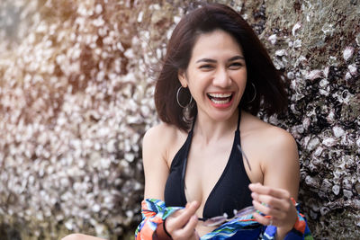 Portrait of smiling young woman