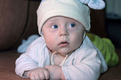 Close-up of baby boy looking away