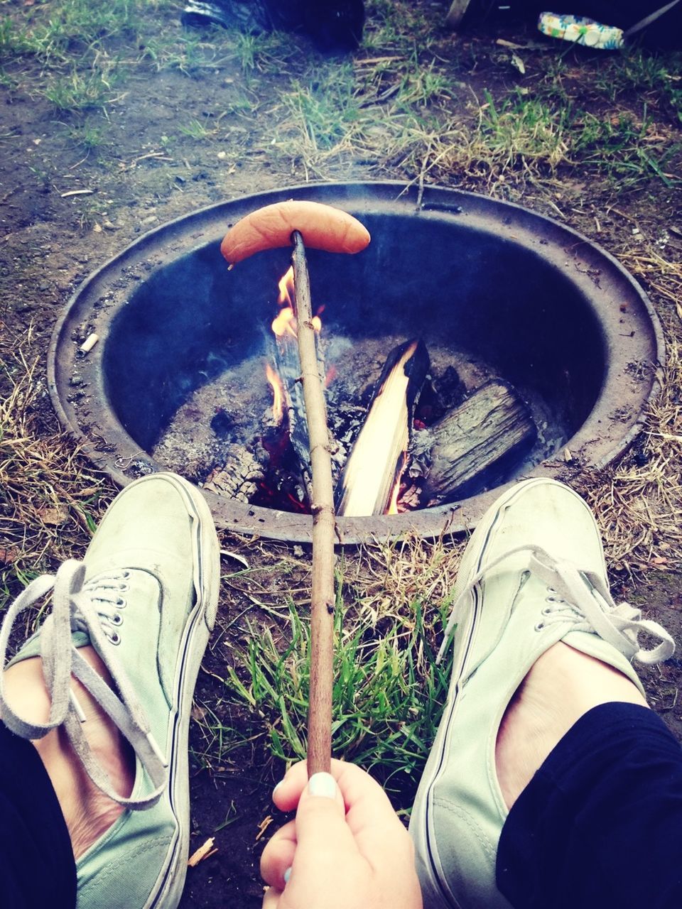 personal perspective, low section, person, part of, lifestyles, shoe, leisure activity, unrecognizable person, human foot, holding, men, high angle view, cropped, standing, outdoors