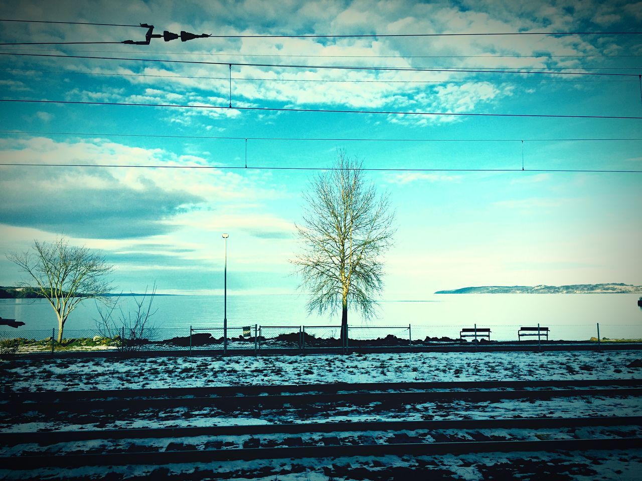 snow, winter, cold temperature, season, weather, sky, covering, field, landscape, nature, cloud - sky, bare tree, tranquility, tree, tranquil scene, beauty in nature, power line, frozen, scenics, building exterior