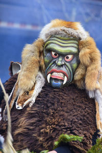 Public and traditional parade with funny masks at carnival