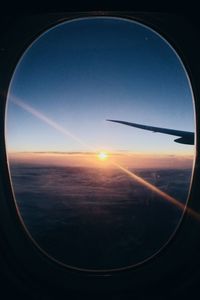 Scenic view of landscape seen through airplane window