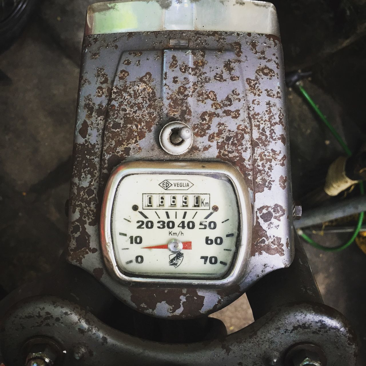 text, communication, western script, old, close-up, metal, number, old-fashioned, no people, day, the past, high angle view, rusty, outdoors, abandoned, obsolete, non-western script, retro styled, metallic, antique