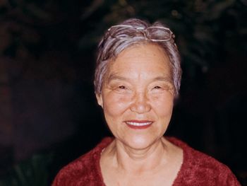 Close-up portrait of a smiling young woman