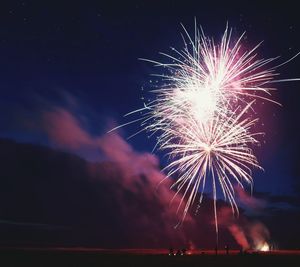 Firework display at night