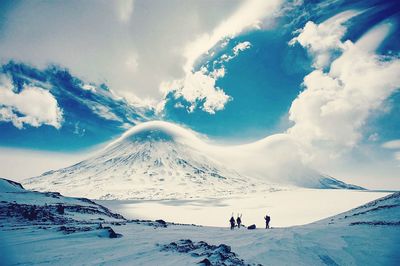 Scenic view of snow covered mountains