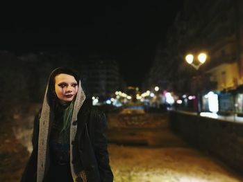 Portrait of woman in winter at night
