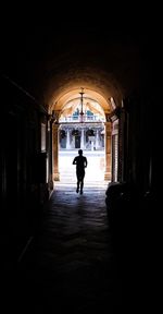 People walking in tunnel