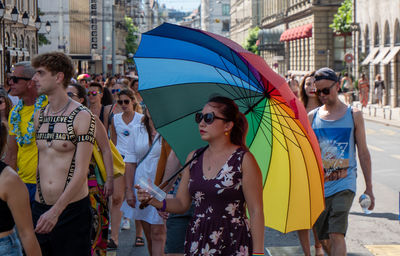 People standing on street in city