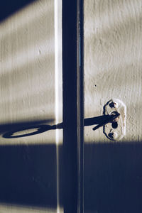 Close-up of key in hole of door