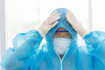 Portrait of person wearing mask