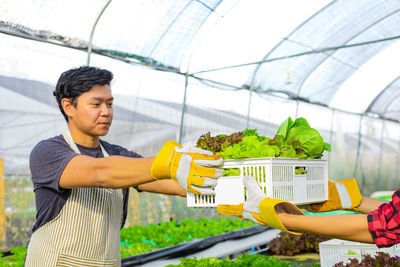 Young man holding food