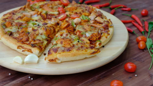 High angle view of pizza in plate on table