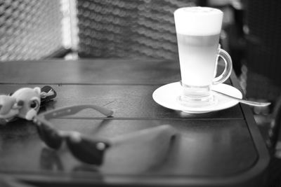 Close-up of coffee cup on table