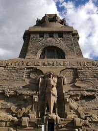 Low angle view of statue of historic building