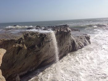 Scenic view of sea against clear sky