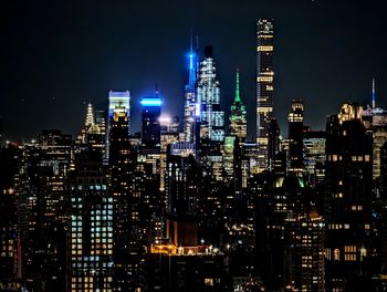 Illuminated buildings in city at night