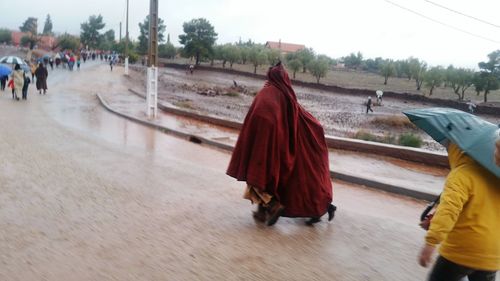 Person sitting on road